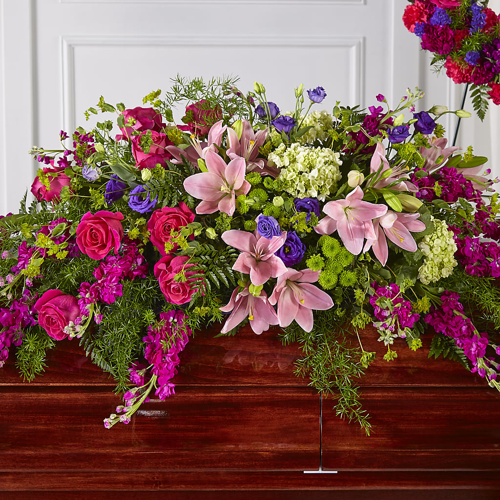 Radiant Tribute Casket Spray – Floral Creations, Mcadoo PA